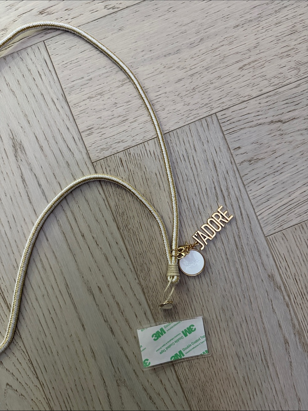 Gold J’Adore Dior phone crossbody strap